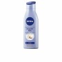 Crema Corporal Nivea Triple Accion 400 ml (400 ml) de Nivea, Hidratantes - Ref: S0589219, Precio: 7,07 €, Descuento: %