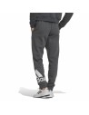 Pantalon de sport long Adidas Essentials Gris foncé Homme | Tienda24 Tienda24.eu