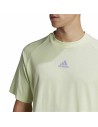 Herren Kurzarm-T-Shirt Adidas Essentials Brandlove Gelb | Tienda24 Tienda24.eu