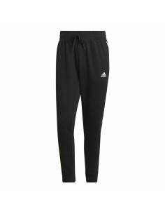 Long Sports Trousers Puma Essentials Logo Men | Tienda24 Tienda24.eu