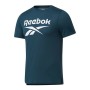 Maglia a Maniche Corte Uomo Reebok Workout Ready Supremium Ciano | Tienda24 - Global Online Shop Tienda24.eu