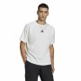 Herren Kurzarm-T-Shirt Adidas Essentials Brandlove Weiß | Tienda24 - Global Online Shop Tienda24.eu