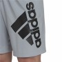 Calções de Desporto para Homem Adidas Big Badge Of Sport Cinzento 9" | Tienda24 - Global Online Shop Tienda24.eu