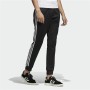 Calças para Adultos Adidas Essentials Trackpant Preto Homem | Tienda24 Tienda24.eu