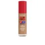 Base de maquillage liquide Rimmel London Lasting Finish Nº 303 Honey Spf 20 30 ml de Rimmel London, Fonds de teint - Réf : S0...