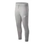 Long Sports Trousers New Balance Essential Stack Logo Grey Unisex by New Balance, Men - Ref: S6431301, Price: 42,64 €, Discou...